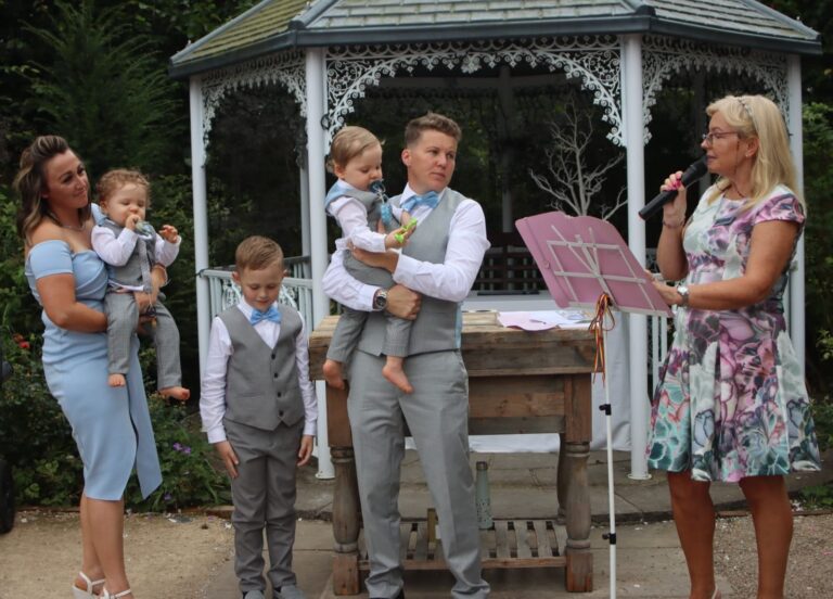 Delighted parents at their three sons naming ceremony 768x552
